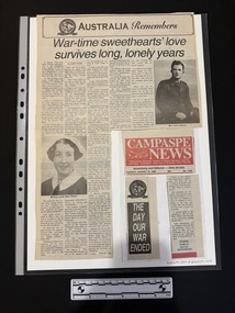A large newspaper clipping featuring a large title, five columns of text and two black and white photos
