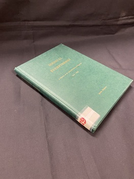 Green hardcover book with gold lettering on the front and spine showing the title and author. There is a white label taped around the bottom of the spine with B129 written in red texta ink.