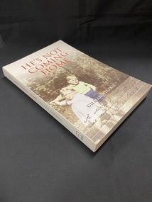 Front of the book shows a photographic image of two children posing for the camera in a garden. The title is printed in red across the top, the author's name is printed in white across the bottom of the image and bellow that the subtitle is printed in black in a handwritten style. The spine of the book is white with the title printed in red and the author in black print.