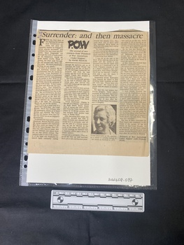 A newspaper clipping consisting of four large columns of text and a small black and white photo