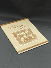 Light brown book with dark brown line across the top and bottom and the title printed in dark brown across the top. There is a sepia toned photo of three nurses sitting by some ferns below the title.