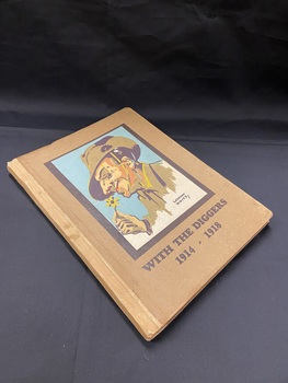 Light brown hardcover book with a lighter brown spine. There is a handdrawn image of a soldier smelling a flower in a dark brown border. The title is printed across the bottom.