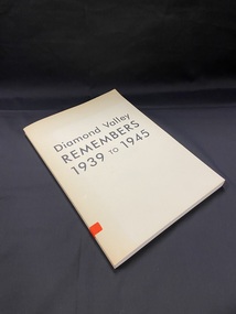Cream coloured paperback book with the title printed across the front cover in black ink. The title is also printed in black ink along the spine. There is a small orange sticker on the lower part of the spine with B143 handwritten in black ink.
