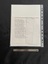 An A4 sheet of paper that has been cut down to a smaller size. The front contains the typed words of the hymn in black ink, the title in underlined in red pen ink. 