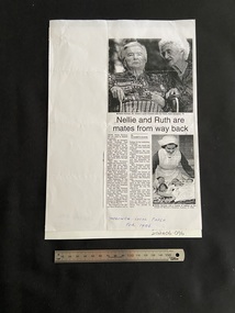 Photocopy of a newspaper clipping. There is a photo of an elderly man and woman at the top half of the page. The lower half shows the title, beneath which is two columns of text and a smaller photo of a nurse with a basket containing five babies.