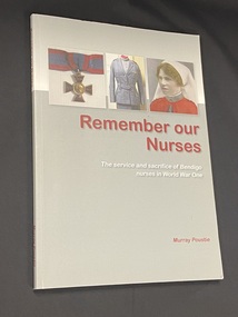 Grey and white paperback book with maroon and white writing on cover and spine. Cover also has three images in square templates in a line across the top; the images depict a medal, uniform and portait of a woman in army nurses uniform. The title is printed below the images.