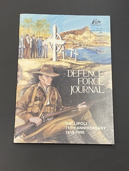 Paperback booklet with two staples down the spine. The front and back covers show illustrations of scenes at Gallipoli blended into one artwork. The top right corner has the emblem of Australia and the date and journal number in black print. The title is in white print in the centre right hand side overlaying the illustration. 'Gallipoli 75th Anniversary 1915-1990 is printed in the lower right corner in white text.