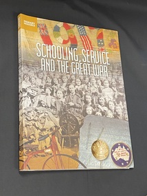 Spiral bound paperback book. The title is printed across the front in white print, as well as along the spine.There is a brown text box in the top left corner that wraps around the spine with the words 'primary resource' printed inside in white text. The background of the cover is a black and white photo of a large group of children knitting, they are standing around a lady with a spinning wheel, at the front left there is a large pile of clothing. Above the photo is a piece of fabric with '1917' colourfully embroidered on it. At the bottom of the page are images of chalk and slate, a bicycle, and two badges from 1916-18.