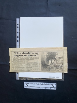 A newspaper article with a title, two columns of text and a black and white photo