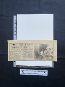 A newspaper article with a title, two columns of text and a black and white photo
