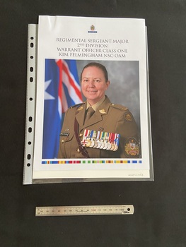 Double-sided colour photocopy. One side has a large coloured photo of Kim Felmingham proudly wearing her medals with the title printed above. The other side has the title printed at the top followed by five paragraphs of text filling the page. Both sides have the RSL care SA emblem at the top and a multi-coloured line across the bottom.