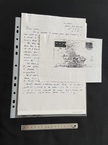 Photocopied pages of a handwritten letter and an addressed air mail envelope with postage marks.