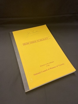 Yellow cover with black spine tape. The main title is printed between two lines across the middle of the cover. The sub-title is printed at the bottom of the page. All text is in maroon print.