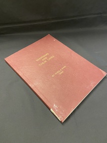 Maroon coloured paperback book with title and author printed in gold print in the centre of the front cover and along the spine. There is a white sticker label at the base of the spine with B69 in red marker.