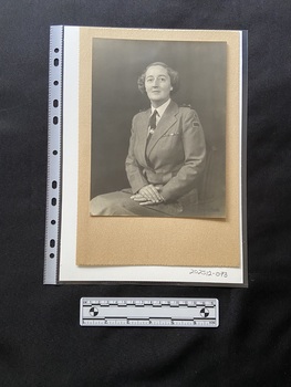 Black and white photo of Mrs Edith Lydia Mackellar [nee Shaw) seated in her Australian Nurses uniform.