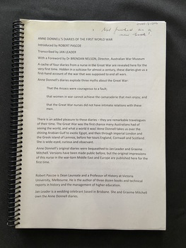 Spiral bound typed document with a clear front cover and black card backcover.