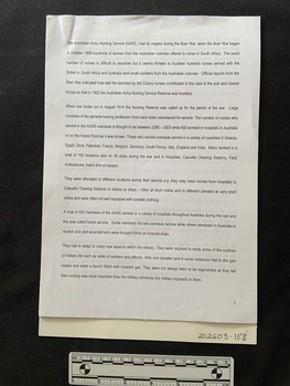 Typed document shows five paragraphs on the first page and the page number in the bottom right corner.