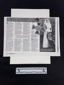 Collection of black and white documents and articles. The cover page is an article containing four columns of text and a long photo of nurse Estelle Lee Archer in uniform standing behind a chair. There is a picture of the Royal Red Cross she was awarded inset above the last column of text.