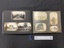 An example of the inside album layout. This image shows the left side with three photographs. The right side is covered with a translucent protective sheet, beneath which is a layout of five photographs and two annotations in white ink.