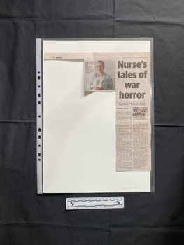 A newspaper clipping that includes the header, a story consisting of a large title and two columns of text and a small colour photo