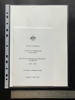 A5 white booklet cover with the Australian coat of arms centre at the top and the information about the State funeral of Vivian Statham (nee Bullwinkel).  Clear black font on the white background.