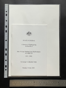 A5 white booklet cover with the Australian coat of arms centre at the top and the information about the State funeral of Vivian Statham (nee Bullwinkel).  Clear black font on the white background.