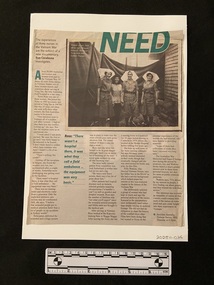 Newspaper clipping with four columns of text and a large square photograph at the top of four women smiling. The title and a quote are printed in green.