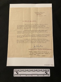 Four paragraph letter typed with a typewriter and hand-signed.