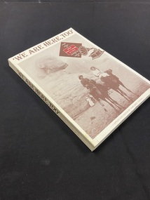 Cream coloured book with title printed in brown text across the top. Under the title is a large rectangle photo of a man and a woman riding two camels in Egypt in sepia tones. At the top of the image is a diamond with the subtitle printed inside, and inside that is a maroon rectangle with the author's name printed in white text. Next to this shape is an image of a gramaphone.