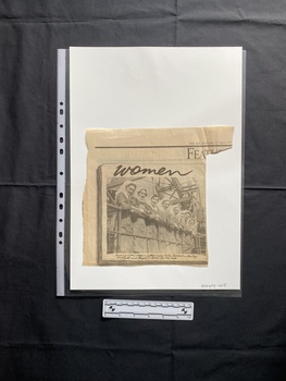 A newspaper clipping of a large black and white photo with a caption beneath