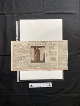 A large newspaper clipping consisting of a title, six columns of text and a black and white photo