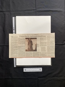 A large newspaper clipping consisting of a title, six columns of text and a black and white photo