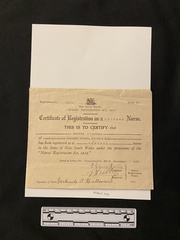 Certificate printed on cream coloured paper. There is an emblem at the top and below it reads 'New South Wales Nurses Registration Act, 1924'. The name and date have been typed in and it has been hand-signed.