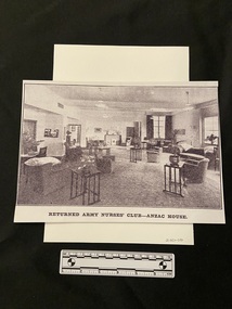 Black and white A4 photocopy of a photograph of a large room at ANZAC House  with armchairs and small tables spread throughout.