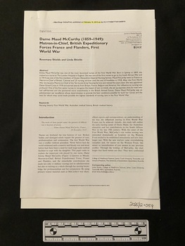 Black and white photocopy of an eight page, double-sided, journal article with text divided into two columns down each page. The article contains two photographic images of Maud McCarthy, one dressed as a Matron and the other as Dame on the occasion of the King's coronation.