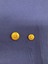 Reverse of buttons showing shank and 'K.G. LUKE PTY. LTD. MELB' makers' mark.