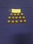 Fourteen brass buttons with an affixed raised Royal Australian Air Force crown and eagle motif. All buttons are the same size.