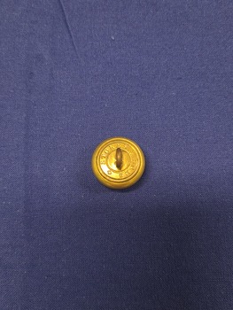Reverse of brass Royal Australian Airforce button with engraved makers mark and metal shank. 