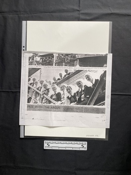 A photocopy of a newspaper clipping of a large black and white photo