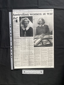 A photocopy of a large magazine clipping, consisting of a title, two large photos and six columns of text