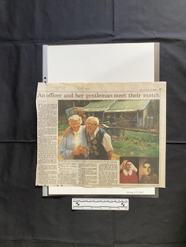 A large newspaper clipping consisting of a title, four columns of text and three colour photos