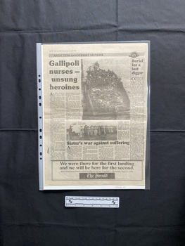 A large newspaper page showing two relevant stories.  The stories consist titles, six columns of text and two black and white photos.