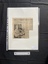 A small newspaper clipping of a title, two columns of text and a black and white photo.  The story continues on the reverse side.