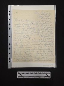 Two-page double-sided handwritten letter on cream paper attached at the top left corner with a staple.  