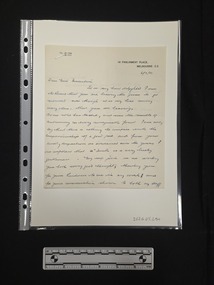 Two-page handwritten letter on cream paper with a black printed letterhead. 