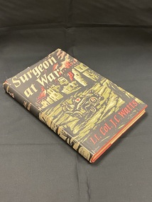 Red hardcover book with black dustjacket. The dustjacket has a drawn image that wraps around the front cover and spine in green red and black, it shows a medical jeep with a driver and three other men going between buildings and strings of barbed wire.  