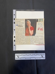 A small newspaper clipping consisting of a title, three columns of text and a colour photo.