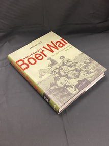Hardcover book with dust-jacket. Army green coloured spine with the title printed in red text and the subtitle below in white. The front cover is a paler green with title in red print across the top. The lower half of the cover shows an image of 8 men (one on horseback), posing for a photo in a field.