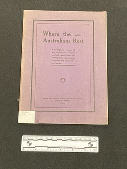 Staple bound paperback booklet with faded dark purple cover. White spine label wrapped around base of spine. Front cover has a black double border and black writing.