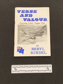 Staple bound white booklet with an image of a military plane on the cover. Wording is printed in blue and red print to match the colours of the Australian flag which is depicted waving in the bottom corner.